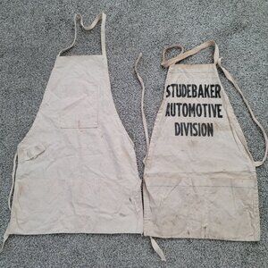 2 Vintage Studebaker Aprons , I Believe these are from the 1950's